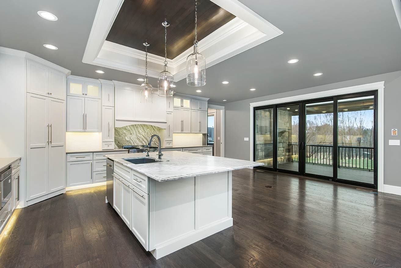 Finished white kitchen with island, Quad Cities